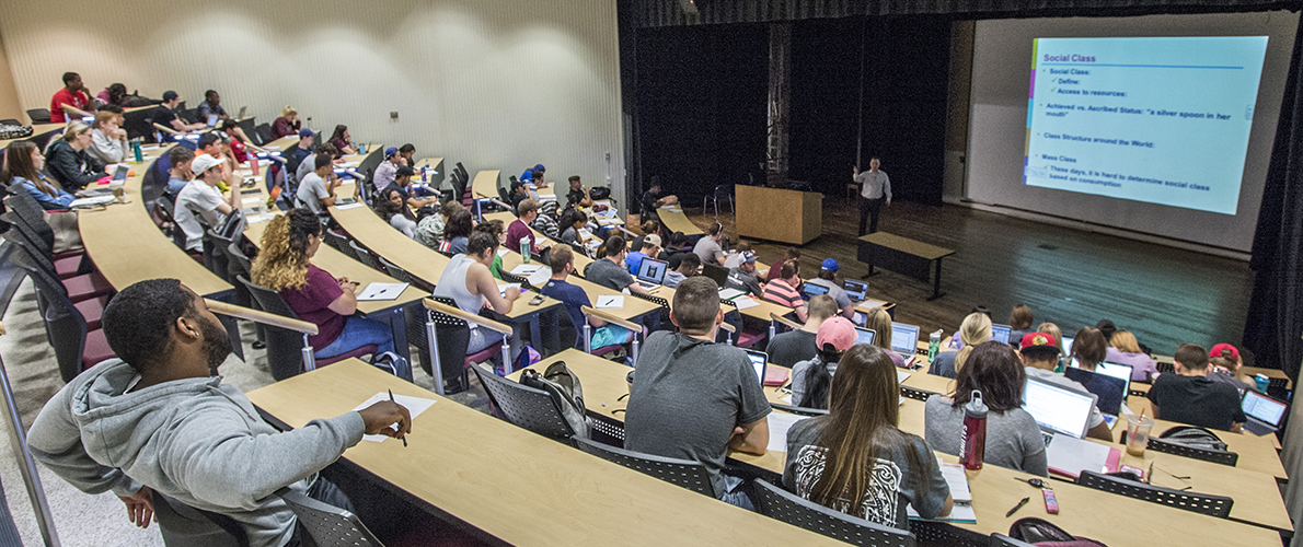 Overhead image of instructor teaching in Quigley Lecture Hall