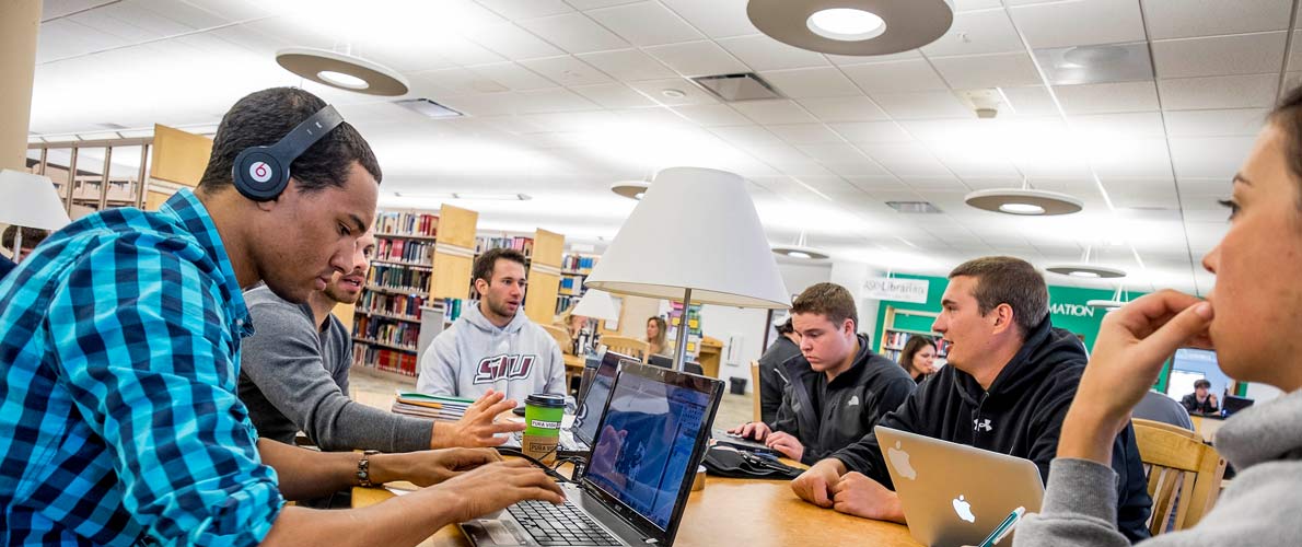 Group of students collaborating in Morris Library