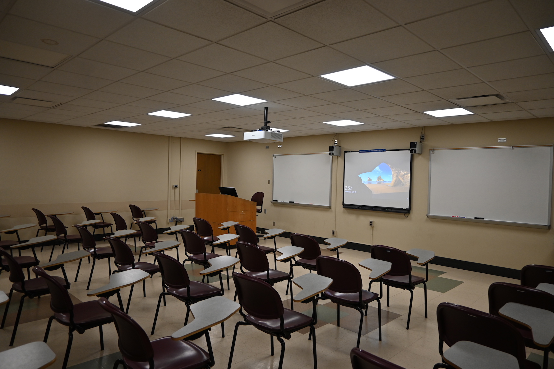 Image of an empty "Advanced Classroom" focusing on the laser projector