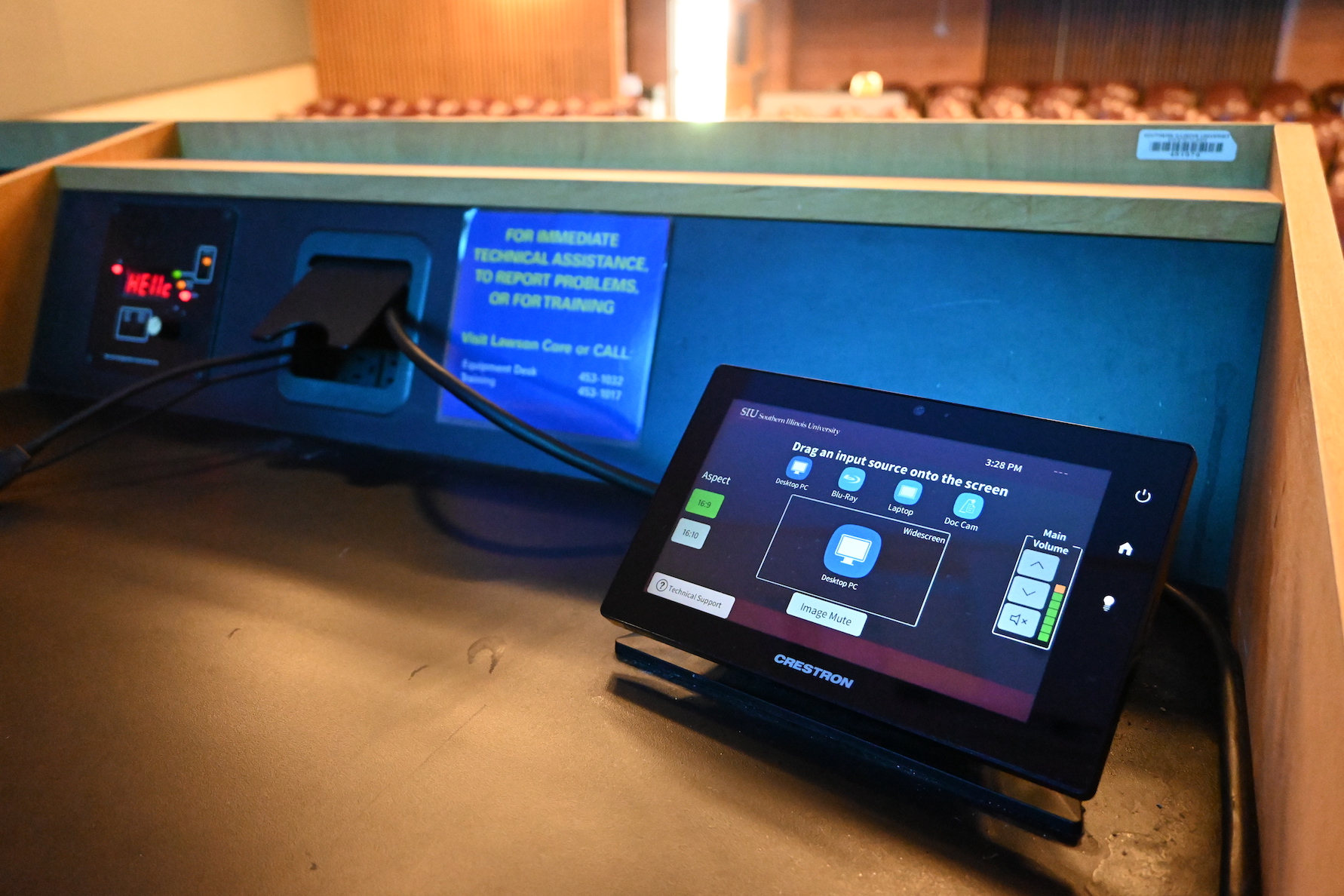 Close up image of the control system on top of podium in a "Large Auditoria" classroom