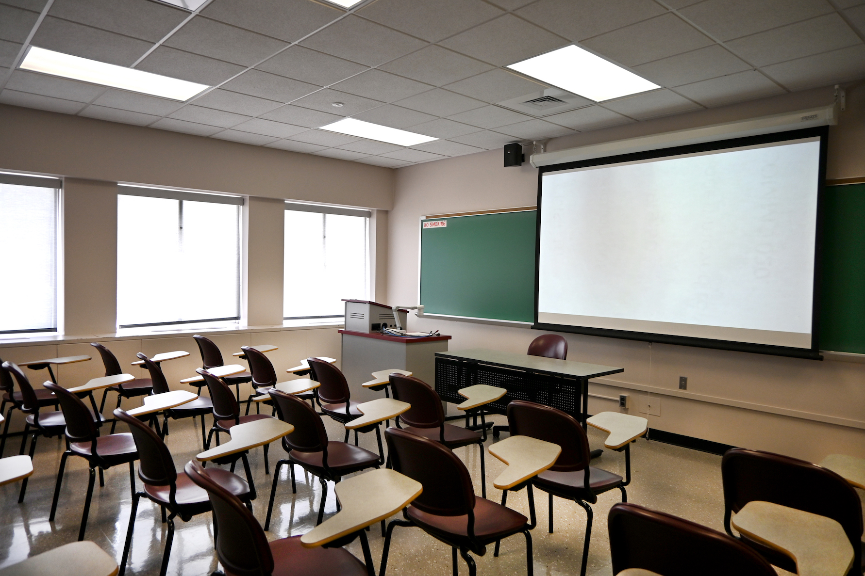 Image showing an empty "Essential Classroom" focusing on the laser projectorconfiguration.